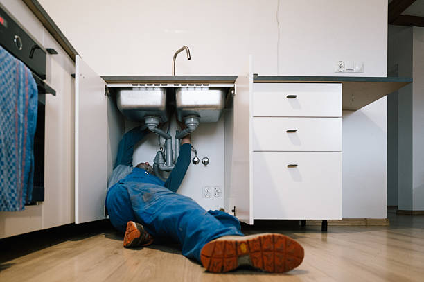 Professional Drain Cleaning technician working in Marion, MS